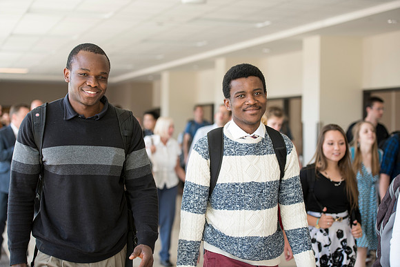 Students and faculty leaving devotional.