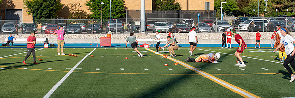 BYU-Idaho Football Teams compete in the Final Game of the Season. Students cheer them on from the stands, as the spirit team and Rix Stix Rally them up.