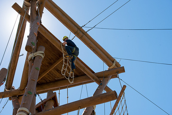 Online Instructors come to BYU-Idaho campus for further learning to enhance teaching skills. Instructors take their turn at the Ropes Course.