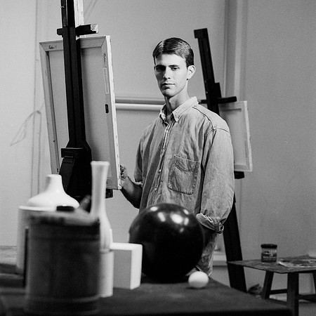 Jayson Russell, Art Major, works on a still life painting.