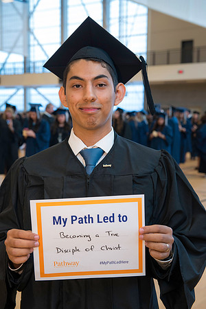Pathway graduates gather before commencement.