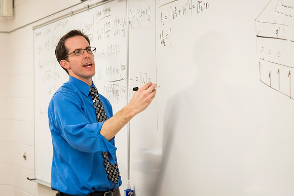 Students in a Civil Engineering class, Reinforced Concrete Design, are taught by Nathan Harris.