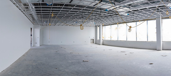 Faculty Members tour the new science building while it is still under construction.