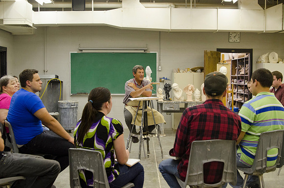 Brother Geddes talking to students the first day of sculpture class