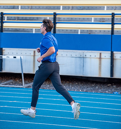 Faculty and community members of BYUI at Speed and Agility triathlete trannings at the stadium.