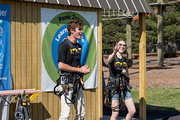 Students gather by the upper fields on the BYU-Idaho Campus to play recreation games, slip 'n' slide, mud volleyball, and try the ropes course.