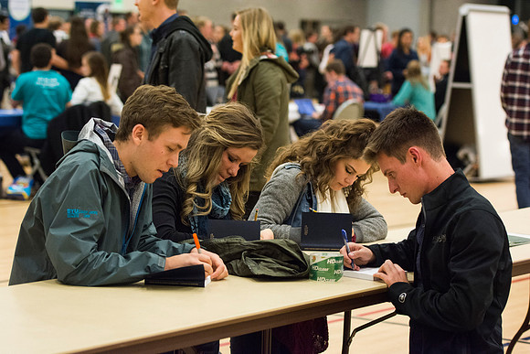 Students do a variety of service activies together with their dates.