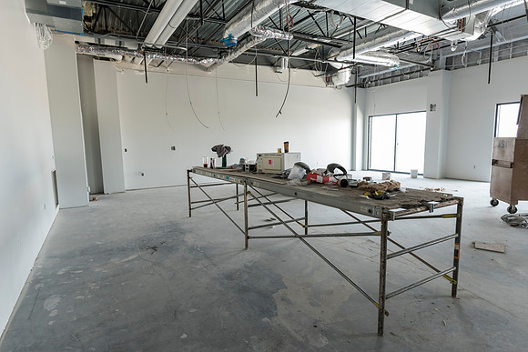 Faculty Members tour the new science building while it is still under construction.