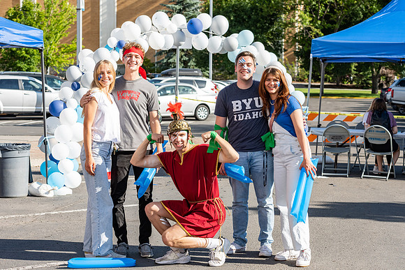 Students gather at the stadium to watch the football championship.