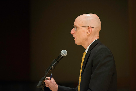 VP Henry Eyring introduces Dr. Maryellen Weimer, who addresses the faculty during a luncheon.