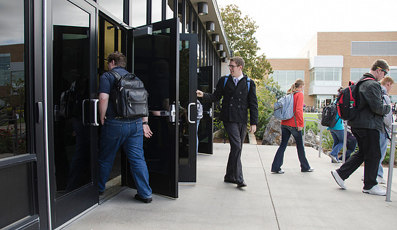 Students walk between classes just outside the Joseph Fielding Smith Building