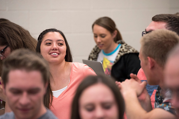Students working with each other in the Foundations of the Restoration course on campus.