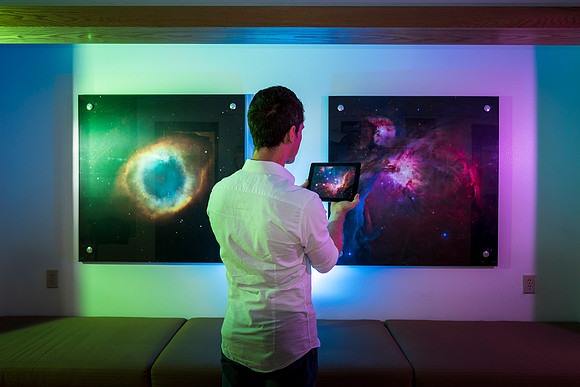 Ryan Chase, a Communication Major, studies the stars in the Romney Building.
