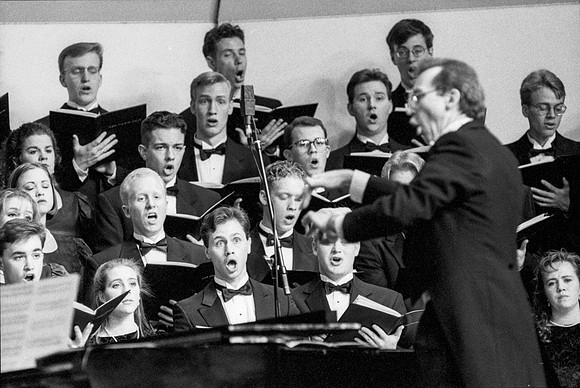 Members of the Choir singing a piece