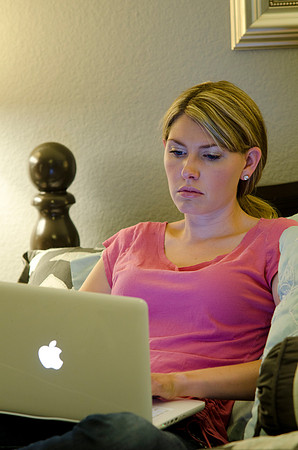 Kati Clark, a Pathway student in Riverside, California, finds time to study for her online classes.