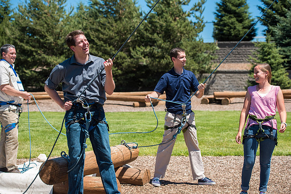 Online Instructors come to BYU-Idaho campus for further learning to enhance teaching skills. Instructors take their turn at the Ropes Course.
