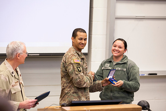 Cadet Garcia receives an award from Retired Air Force Colonel Kearsley, for her outsanding performance this year. She was 1 of 13 Junior Cadets who sacrifice between 15-20 hours a week for the ROTC pr