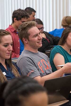 Students working with each other in the Foundations of the Restoration course on campus.