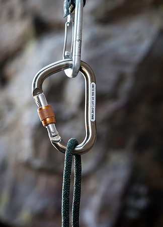 Detail shots of a carabiner. (Climbing wall up Kelly Canyon)