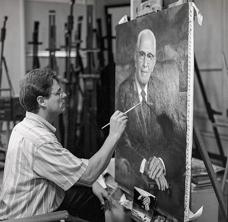 Leon Parson, artist, paints President Ezra Taft Benson.
