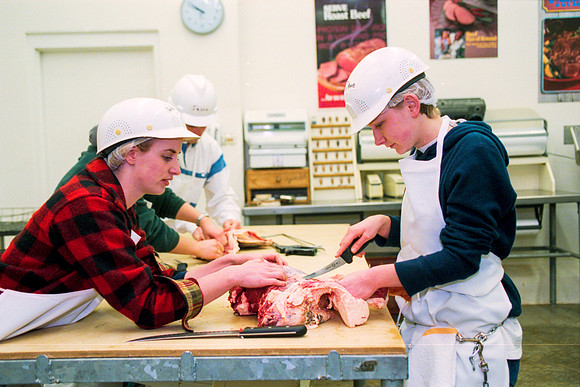 Students participate in a Meat Cutting Lab. February 2000.