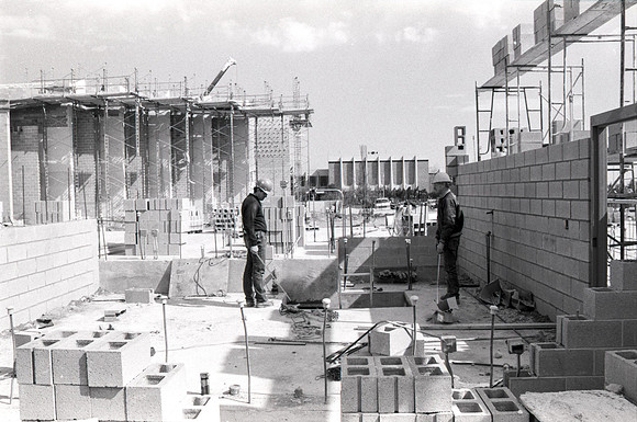 Construction takes place on the Religion Building site.
