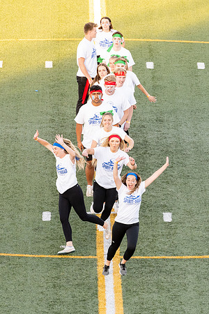 Students gather at the stadium to watch the football championship.