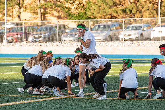 BYU-Idaho Football Teams compete in the Final Game of the Season. Students cheer them on from the stands, as the spirit team and Rix Stix Rally them up.
