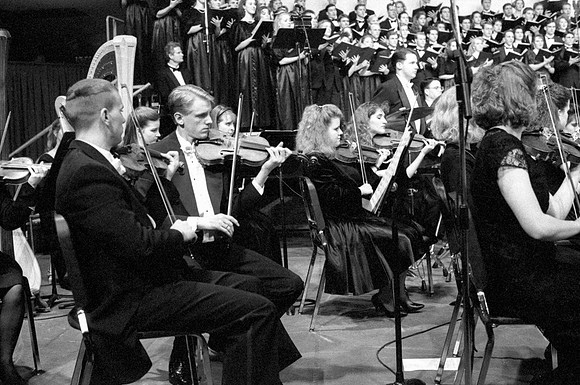 Members of the Orchestra performing a piece