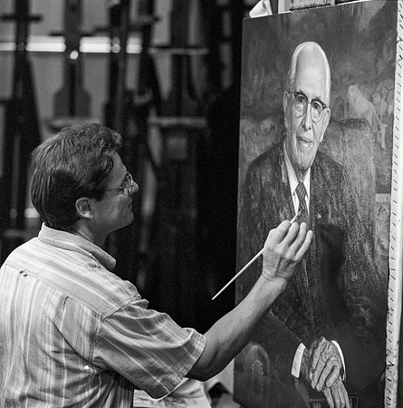 Leon Parson, artist, paints President Ezra Taft Benson.