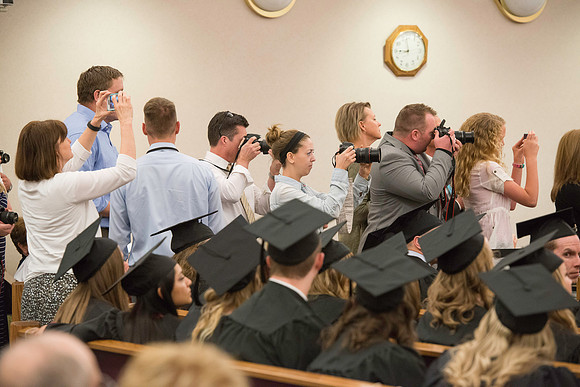 Convocation for the College of Education and Human Development was held in the Stake Center next to the Temple. Elder Kim B. Clark, Commissioner of Church Education gave some remarks and congratulated