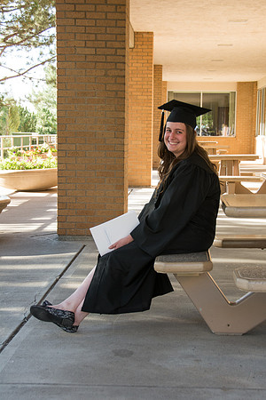 Faculty, family and graduates around campus after the commencement ceremony.