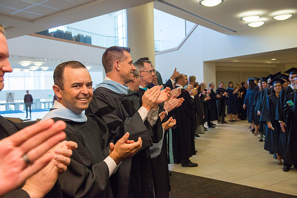 Graduates gather for BYU-Idaho commencement. Graduates march in during the processional.