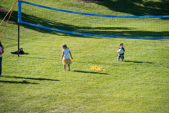 Faculty and their families, as part of the Online Learning & Teaching Conference, join together for dinner and games.