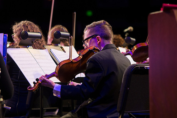 Brigham Young University-Idaho's Symphony Orchestra, Collegiate Singers, Concert Choir, Men's Choir, and Women's Choir rehearses in the I-Center for their "The Redeemer" performance.