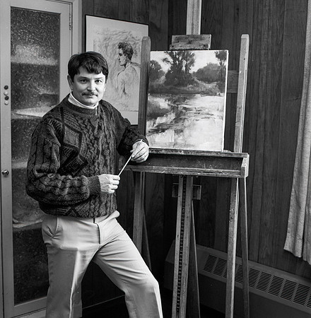 Nolan Pearson stands next to his work.