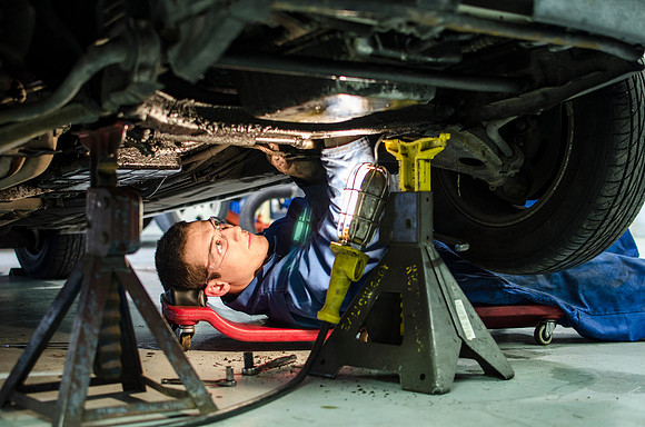 Automotive students get real practical expeience working on cars during lab time.