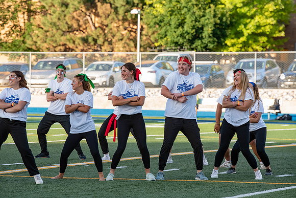 BYU-Idaho Football Teams compete in the Final Game of the Season. Students cheer them on from the stands, as the spirit team and Rix Stix Rally them up.