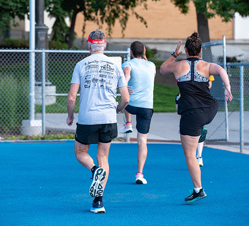 Faculty and community members of BYUI at Speed and Agility triathlete trannings at the stadium.