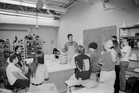 Rich Briggs demonstrates to the students in class.