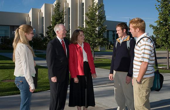President and Sister Clark on campus with students.
