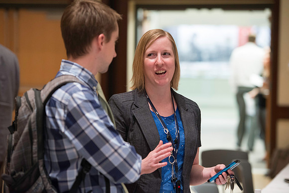 Faculty mingle after Dr. Maryellen Weimer addresses the faculty during a luncheon.