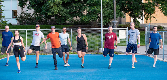 Faculty and community members of BYUI at Speed and Agility triathlete trannings at the stadium.