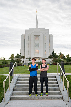 Team members pose by the Rexburg temple before they begin the temple to temple run