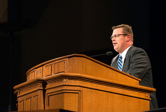 President Gilbert addresses the students the first devotional of the semester.