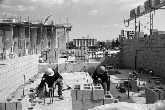 Construction takes place on the Religion Building site.