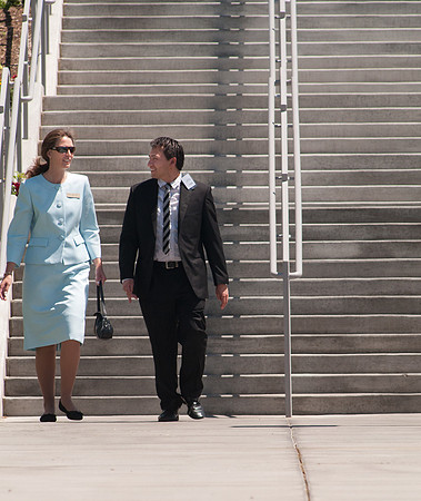 Regina Hull (Blue), over Education Week, and student Adrian Medina walk to Education week Devotional