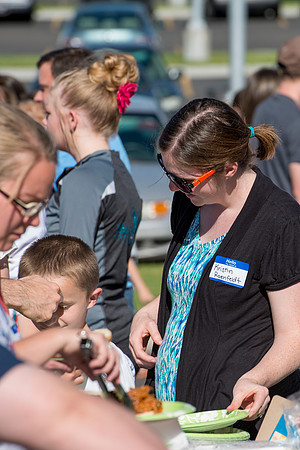 Faculty and their families, as part of the Online Learning & Teaching Conference, join together for dinner and games.