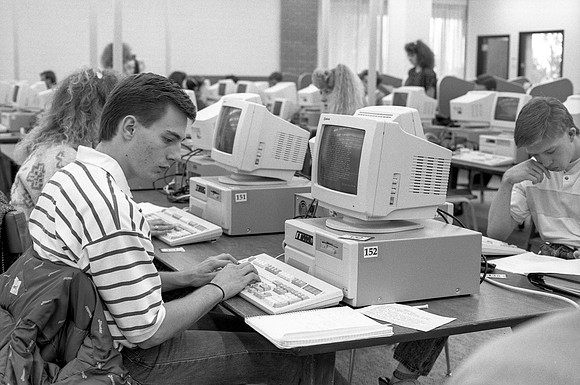 Students work in the Computer Lab on campus. November 1990.