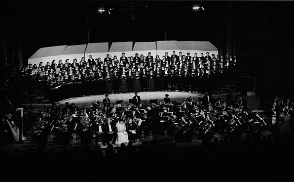 Sacred Music Series: Visions of Eternity. Choir members sing a piece for the performance. Performance held in the Hart Auditorium of Ricks College.